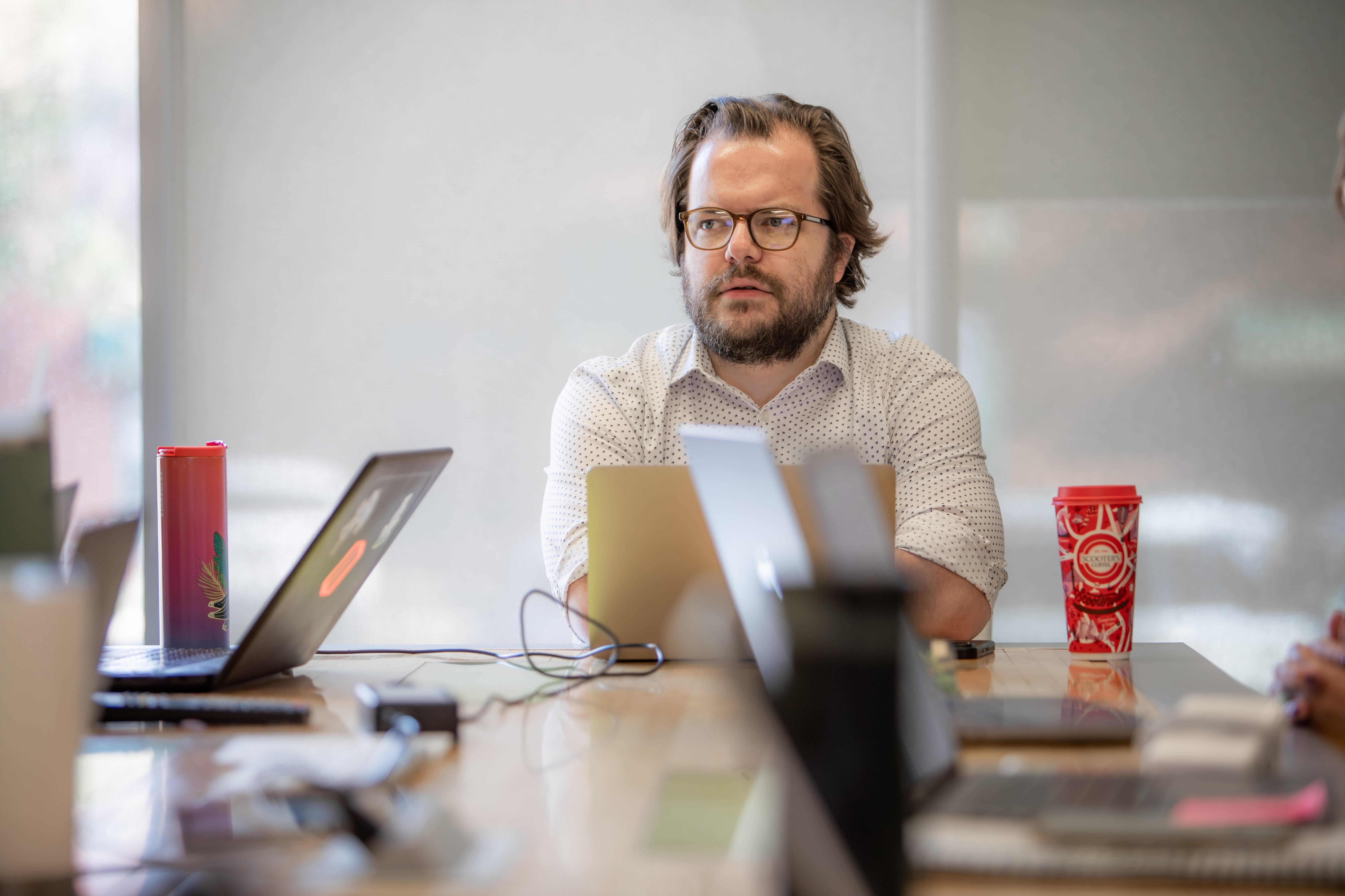 Creative Director, Luke Tatge, in a meeting