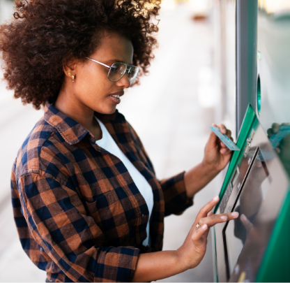 Women making a payment with card.