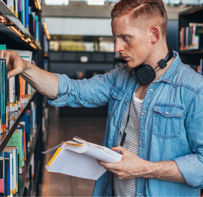 Man finding a book.
